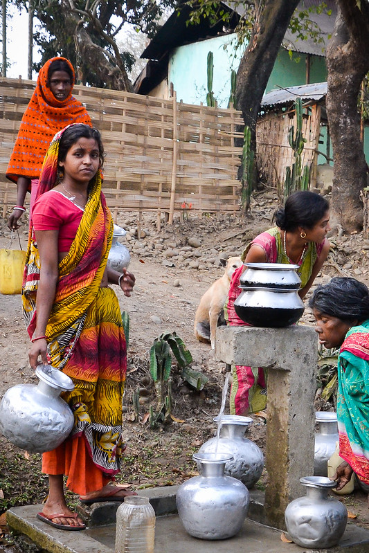 women fetching water in India